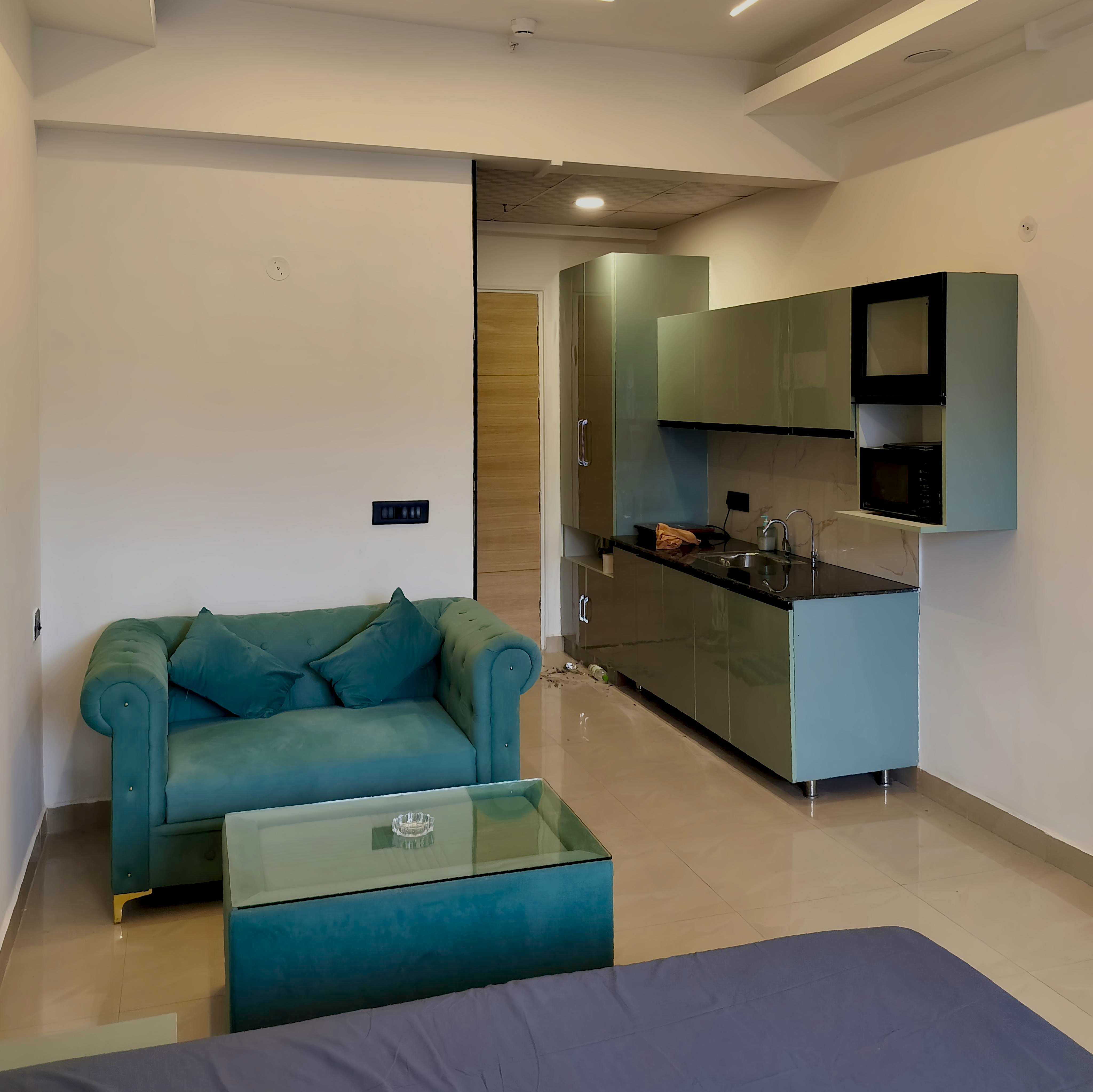 View of the plush bed and studio interior